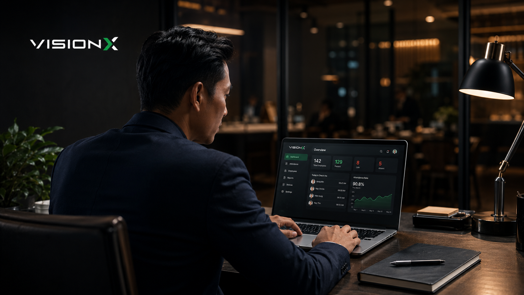 Myanmar business manager reviewing Vision X dashboard